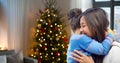 Happy mother hugging her daughter on christmas Royalty Free Stock Photo