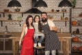 Family holidays. Mother father and daughter cooking together. Happy child with parents cooking in kitchen. Family Royalty Free Stock Photo