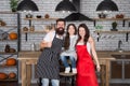 Family holidays. Mother father and daughter cooking together. Happy child with parents cooking in kitchen. Family Royalty Free Stock Photo