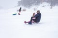 Family holidays in the mountains, sledding, skiing , snowboarding and other winter activities in the bosom of nature. Royalty Free Stock Photo
