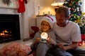 Family at home at Christmas time Royalty Free Stock Photo