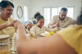 Family, home and holding hands in prayer while eating at dinner table with grandparents, children and food. Happy people Royalty Free Stock Photo