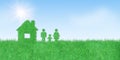 Family and home icon on green artificial grass with blue sky and sunlight in background. Royalty Free Stock Photo