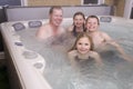 Family in hot tub Royalty Free Stock Photo