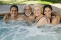 Family in hot tub portrait.