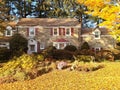 Family house with front yard in fall colors Royalty Free Stock Photo