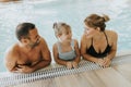 Family in the indoor swimming pool Royalty Free Stock Photo