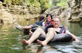 Family on inflatable tube Royalty Free Stock Photo