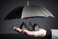 Family insurance, life and property safety concept, protection umbrella concept. Royalty Free Stock Photo