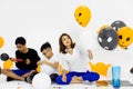 Family join together for preparing fancy balloon for party. Concept for funny activity in halloween festival