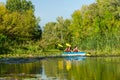 Family kayaking, mother and child paddling in kayak on river canoe tour, active autumn weekend and vacation, sport and fitness Royalty Free Stock Photo