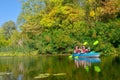 Family kayaking, mother and child paddling in kayak on river canoe tour, active summer weekend and vacation