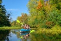 Family kayaking, mother and child paddling in kayak on river canoe tour, active summer weekend and vacation Royalty Free Stock Photo