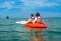 Family kayaking, mother and daughter paddling in kayak on tropical sea canoe tour near islands, having fun, active vacation Royalty Free Stock Photo