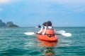 Family kayaking, mother and daughter paddling in kayak on tropical sea canoe tour near islands, having fun, active vacation Royalty Free Stock Photo
