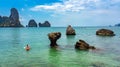 Family kayaking, mother and daughter paddling in kayak on tropical sea canoe tour near islands, having fun, active vacation Royalty Free Stock Photo