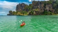 Family kayaking, mother and daughter paddling in kayak on tropical sea canoe tour near islands, having fun, Thailand, Krabi Royalty Free Stock Photo