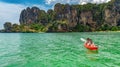 Family kayaking, mother and daughter paddling in kayak on tropical sea canoe tour near islands, having fun, Thailand, Krabi Royalty Free Stock Photo