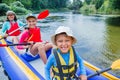 Family kayaking on the river Royalty Free Stock Photo