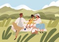 Family with kid on summer picnic. Happy biracial parents and child relaxing on blanket on grass in nature. Mother