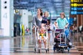 Family with kids at airport Royalty Free Stock Photo