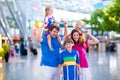 Family with kids at airport Royalty Free Stock Photo