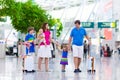 Family with kids at airport Royalty Free Stock Photo