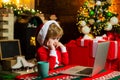 Family with kids celebrating Christmas at home. New Year surprise present. Joy and happiness. Boy child with laptop near Royalty Free Stock Photo