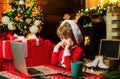 Family with kids celebrating Christmas at home. New Year surprise present. Joy and happiness. Boy child with laptop near Royalty Free Stock Photo
