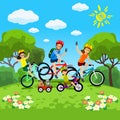 Family with kids concept of cycling in the park. Happy family riding bikes. The family in the park on bicycles Royalty Free Stock Photo