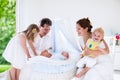 Family with kids playing with newborn baby Royalty Free Stock Photo