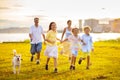 Family with kids running outdoor at sunset Royalty Free Stock Photo