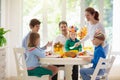 Family with kids at Thanksgiving dinner. Turkey Royalty Free Stock Photo