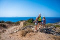 Family with kids tourists standing above Preveli beach, Crete, Greece Royalty Free Stock Photo