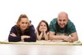 Family laying in a row Royalty Free Stock Photo