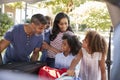 Family Leaving For Vacation Loading Luggage Into Car Royalty Free Stock Photo