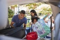 Family Leaving For Vacation Loading Luggage Into Car Royalty Free Stock Photo