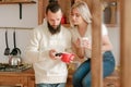 Family leisure couple coffee kitchen smartphone