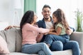 Family Leisure. Joyful Middle Eastern Parents Having Fun With Daughter At Home Royalty Free Stock Photo