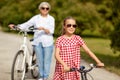 Grandmother and granddaughter with bicycles Royalty Free Stock Photo