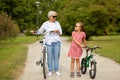 Grandmother and granddaughter with bicycles Royalty Free Stock Photo