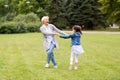 Grandmother and granddaughter playing at park Royalty Free Stock Photo