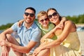 Happy family hugging on summer beach Royalty Free Stock Photo