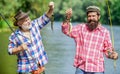 Family let you be who you are. summer weekend. mature men fisher. two fisherman with fishing rods. hobby and sport Royalty Free Stock Photo