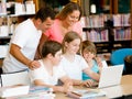 Family in library Royalty Free Stock Photo