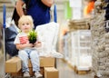 Family with little boy choosing the right furniture for their apartment Royalty Free Stock Photo