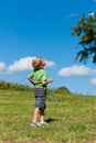 Family - little boy playing badminton outdoors Royalty Free Stock Photo