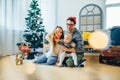 Family and little son playing home on Christmas holidays. New Year holidays Royalty Free Stock Photo