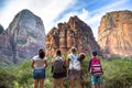 A Family looking at the amazing rock formations at Zion National Park