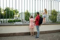 Family looking at the Presidential Palace, located in Vilnius Old Town, the office and eventual official residence of the Royalty Free Stock Photo